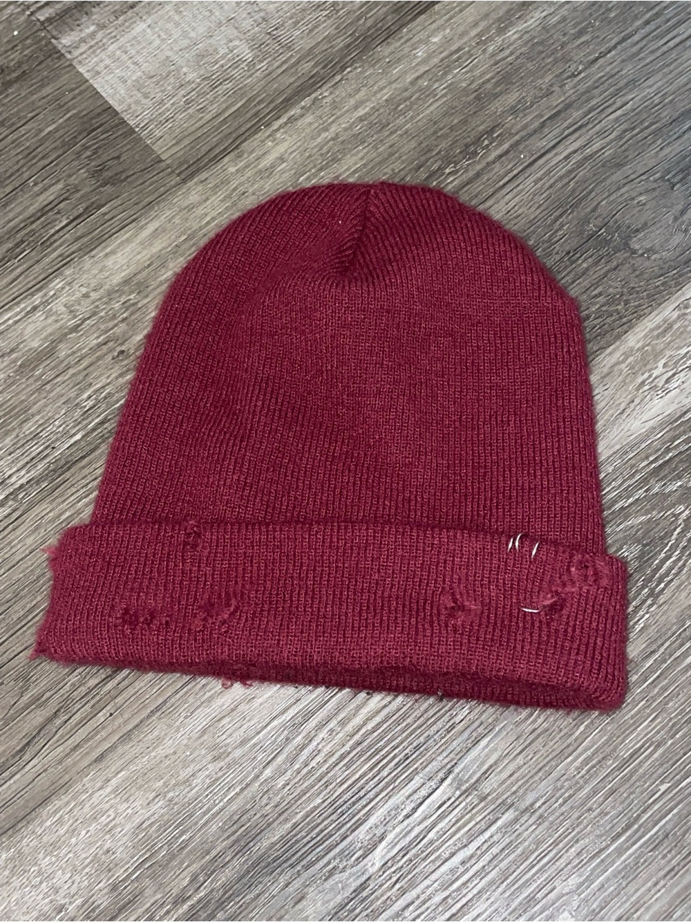 Distressed Burgundy Knit Beanie Hat with metal ring attachments